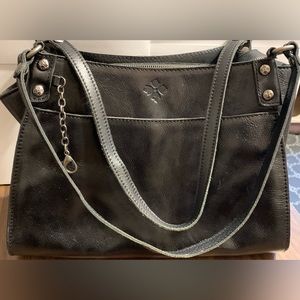 Patricia Nash black leather purse with suede lining